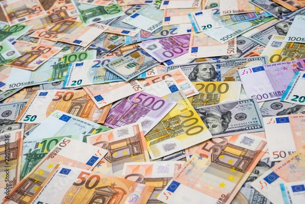 Obraz Euro and dollars banknotes  as background