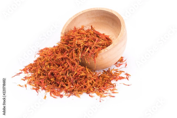 Obraz Dried safflower in wooden bowl isolated on white background