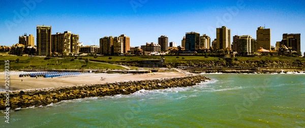 Fototapeta Sky view of Mar del Plata Argentina – high resolution drone photo of the Argentinian coast and downtown area of Mar del Plata Casino Central in spring time.  Buenos Aires Capital Federal district  