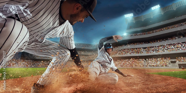 Obraz Baseball players on professional dramatic stadium. Baseball tagged out