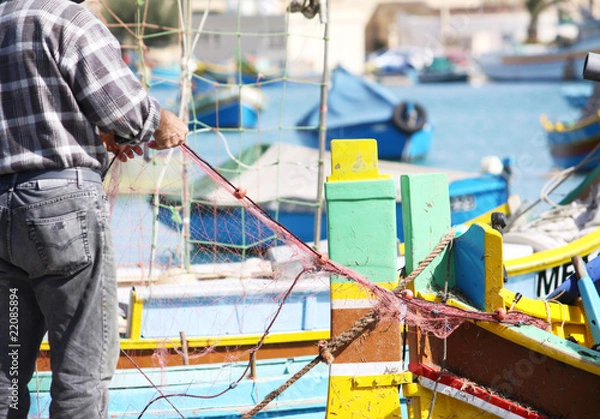 Fototapeta fisherman sorting nets