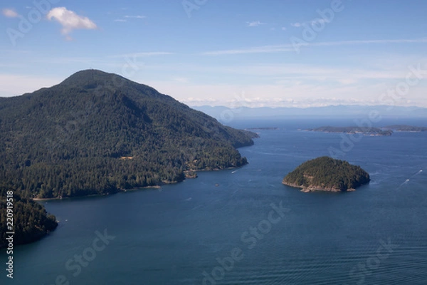 Fototapeta Aerial view of Bowen Island during a sunny summer day. Located in Howe Sound, Northwest of Vancouver, BC, Canada.