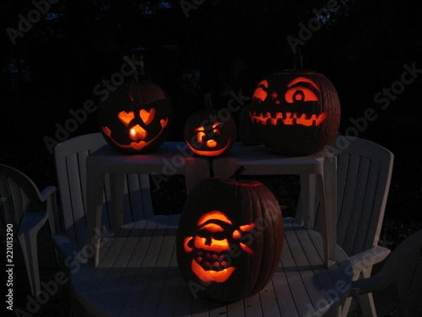 Fototapeta Illuminated Halloween Pumpkins or Jack-o-lanterns