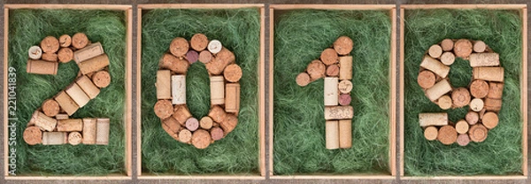 Obraz 2019 New year numbers made of wine corks on green background in wooden box  Banner