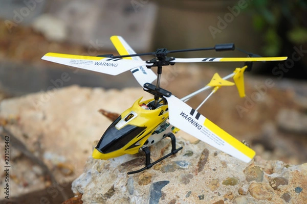 Obraz Mini Helicopter toy white background.