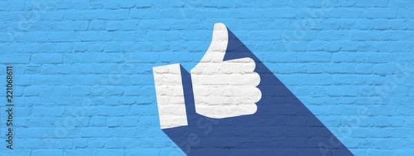 Obraz Kciuki w górę na ścianie z cegieł