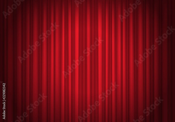 Fototapeta Red curtains background illuminated by a beam of spotlight