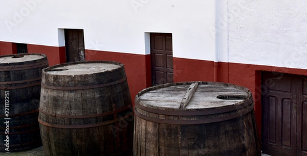 Fototapeta old barrels of cider in the street