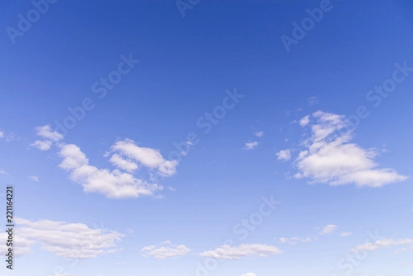 Fototapeta Blue sky and white fluffy tiny clouds background and pattern