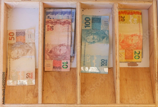 Obraz drawer with Brazilian money notes.