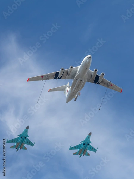 Fototapeta The IL-78 simulates refueling two Su-34.