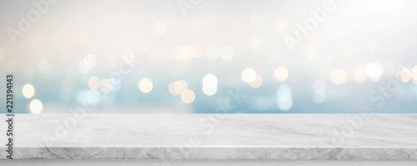 Fototapeta Pusty biały kamień marmurowy blat i niewyraźne abstrakcyjne tło transparent bokeh - może służyć do wyświetlania lub montażu produktów.