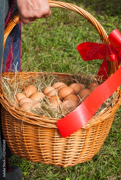 Obraz Wicker basket with fresh eggs
