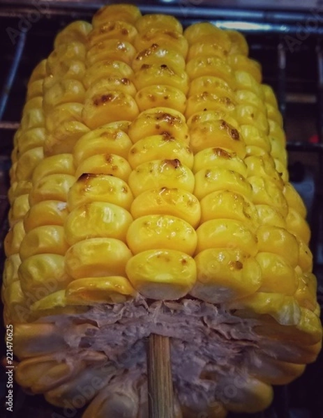 Obraz Roasted corn stick are done on the stove.