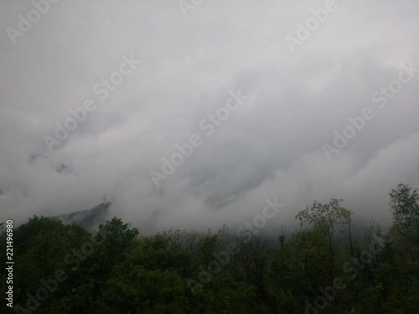 Fototapeta clouds in mountains