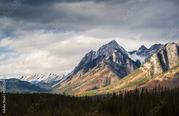 Obraz Dramatic Cloudscape Sky and Distant Snowcapped Mountain Peaks Canadian Rockies