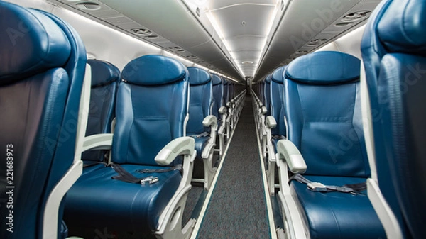 Fototapeta Empty seats in economy class airplane