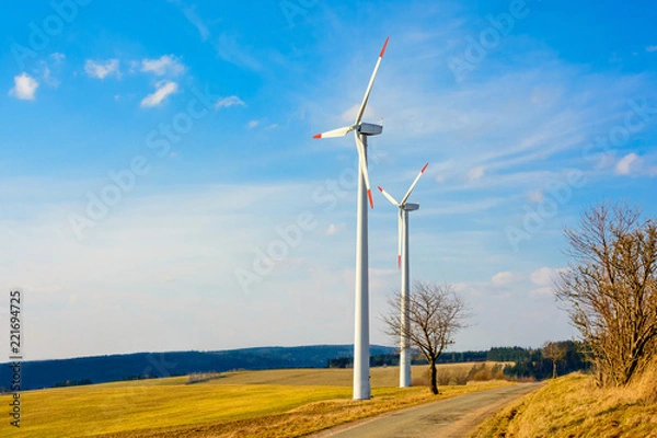 Obraz Wind power plants in the Czech Republic as a source of green energy. Turbine green energy electricity technology concept. Renewable wind energy. Power generation with wind turbines in a wind farm.