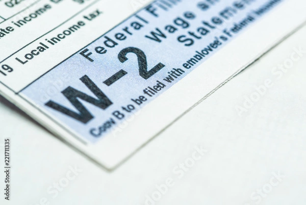 Fototapeta Tax form W-2 up close macro