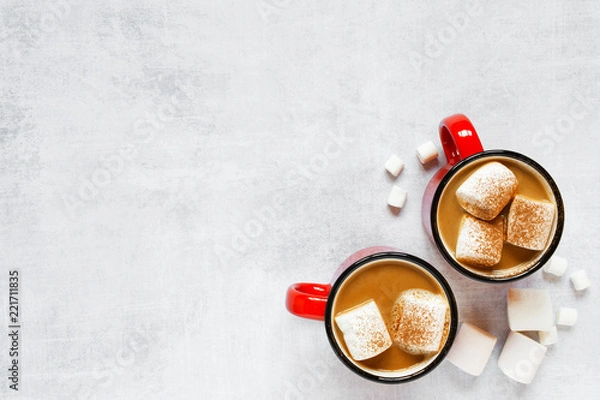 Fototapeta Background with two mugs of hot chocolate