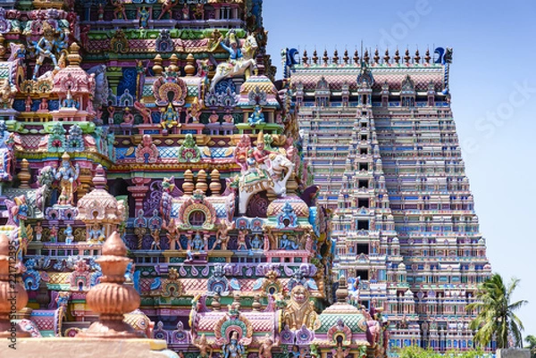Fototapeta Gopurams in Sri Ranganathaswamy Temple, India. A Gopuram is a monumental gatehouse tower, usually ornate, at the entrance of a Hindu temple usually found in the southern India