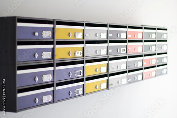 Fototapeta A colorful combined mailbox with spring colors