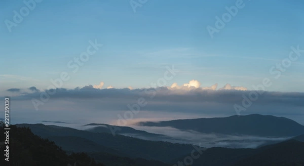 Fototapeta Fog settles between mountains in Shenandoah National Park, VA on a foggy morning.