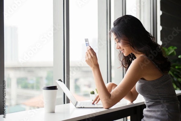 Fototapeta Technology stay in our daily life. Shopping at home on internet. A lot online shop for looking for new thing. And the great payment is Visa, Credit card is famous and easy way to buy everting online.