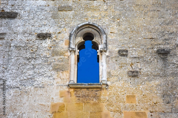 Fototapeta Italy, Gioia del Colle, Norman-Swabian Castle, 9th century. View of the internal facades of the court. Detail of windows.