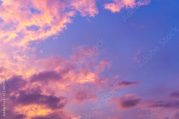 Fototapeta scenic view of beautiful blue sky with clouds that reflect on sun light from sunset in the evening time, magic hours, landscape and background concept.