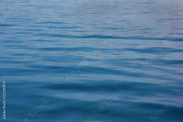 Fototapeta The open sea with calm waves