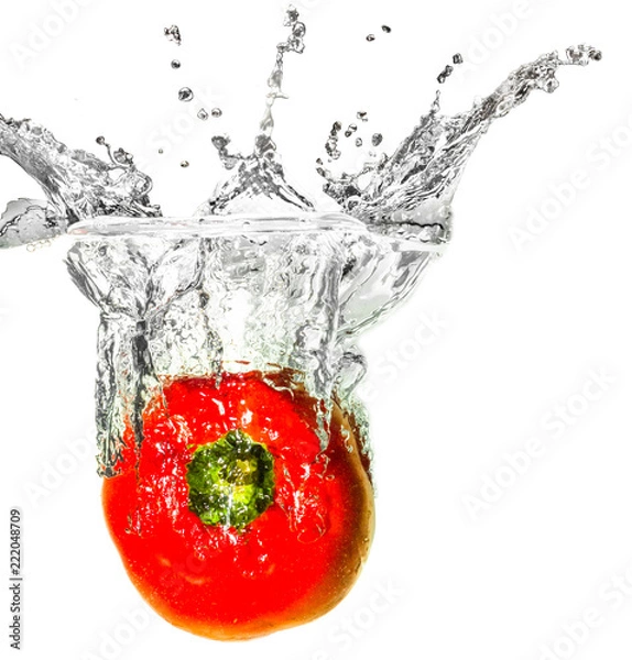 Fototapeta Red bell pepper dropped into liquid creating creative splash