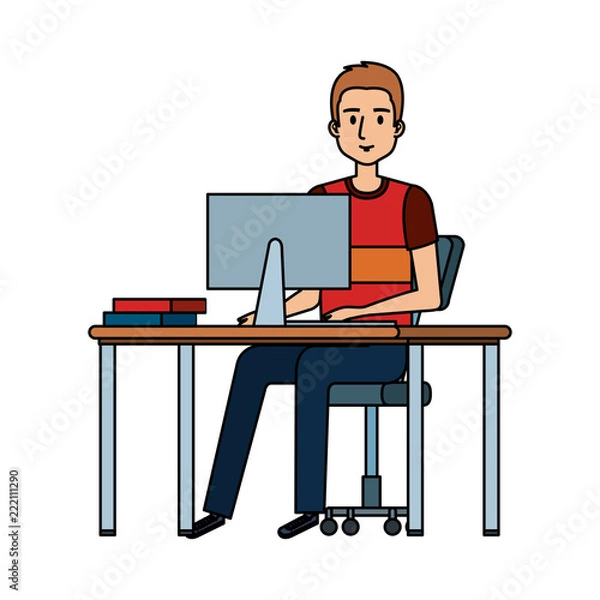 Fototapeta young man at desk with computer