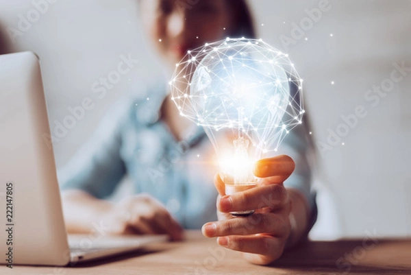Fototapeta Creativity and innovative are keys to success.Concept of new idea and innovation with Brain and light bulbs.