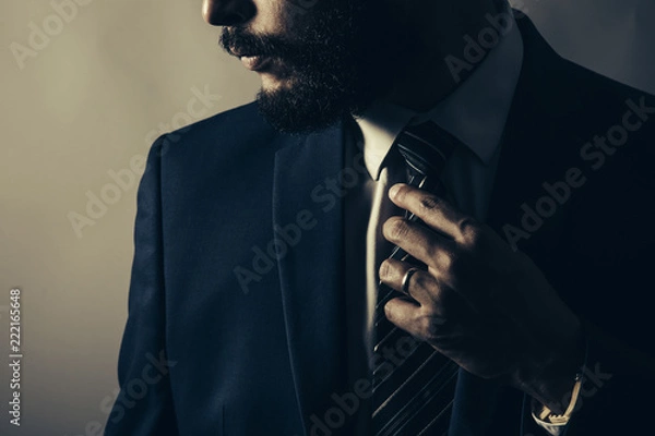 Obraz Beard man wearing a blue suit