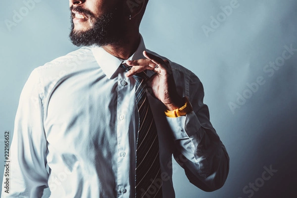 Obraz Corporate beard man releases tight tie 