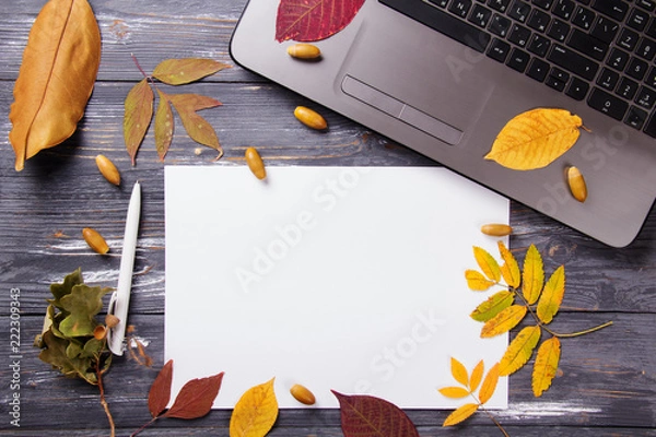 Obraz Office table with computer and autumn leaves.
