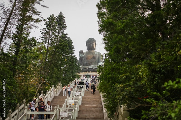 Fototapeta Lantau Island, Hong Kong april 2018: Tourists walk up 268 steps to see Tian Tan Buddha, also known as the Big Buddha