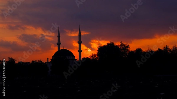 Fototapeta red sunset over the mosque