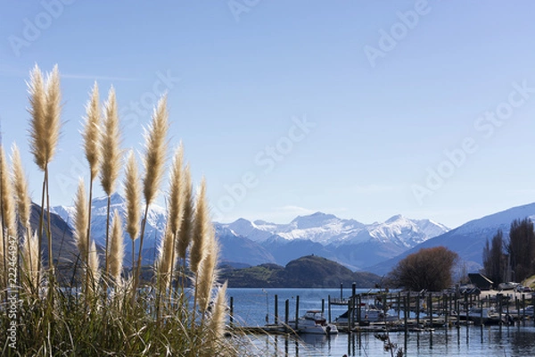 Obraz Beautiful view on scenic lake Wanaka, New Zealand. Lake Wanaka is an attractive touristic destination on the South Island. It is good for recreative activies such as walking, hiking, swimming boating