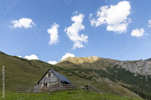 Fototapeta alpine hut krumpenalm beneath Eisenerzer Reichenstein, a mountain in the Ennstal Alps in the Austrian federal state of Styria