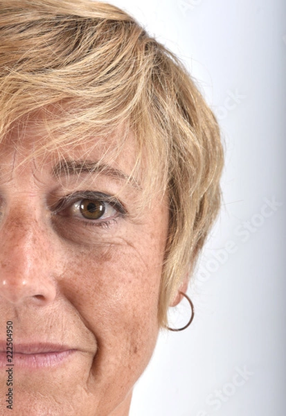 Fototapeta close-up of the face of a middle-aged woman