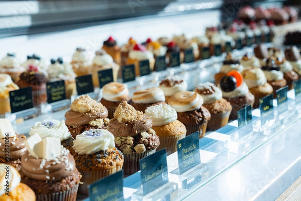 Fototapeta Assortment of cakes at a bakery