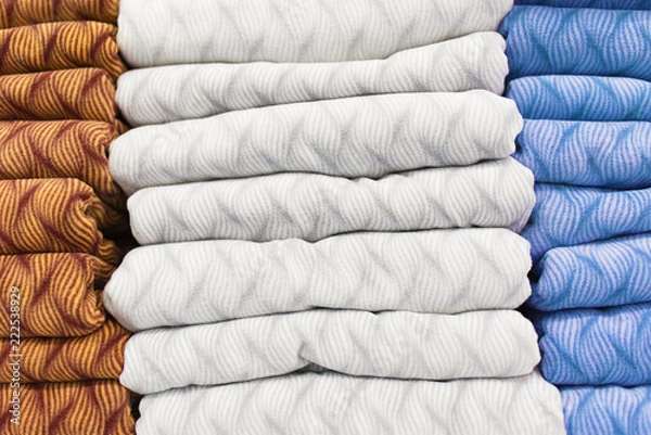 Obraz Warm clothing on shelves in the store
