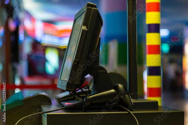 Fototapeta Electronic point of sale machine with colorful background