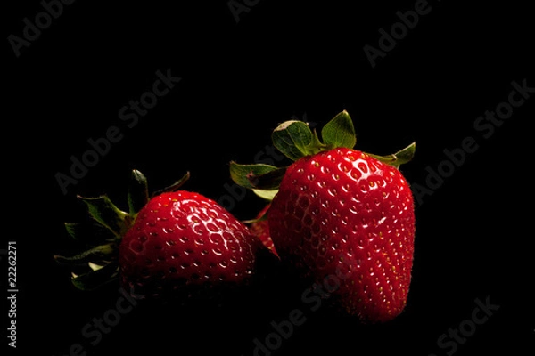 Obraz Strawberries on black background
