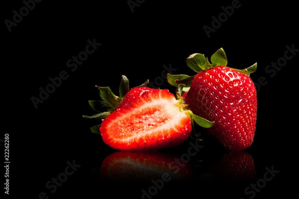 Obraz Strawberries on black background