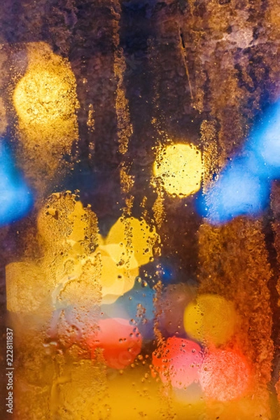 Obraz Rain drops on window with bokeh. Vertical composition