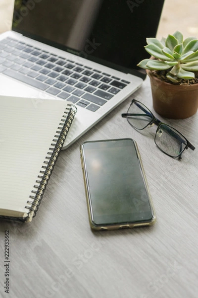 Fototapeta Flat lay laptop grey background