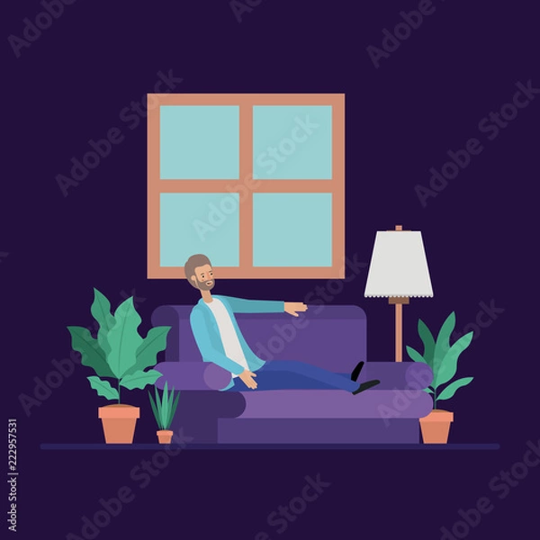 Fototapeta young man relaxing on the livingroom